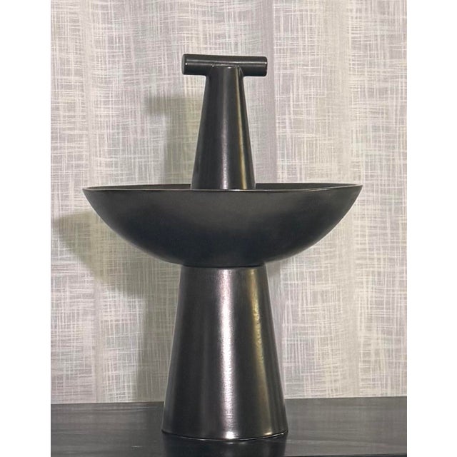 Striking and sculptural, this Champion Bowl by Studio A (Global Views) in a rich graphite finish brings bold, modern...