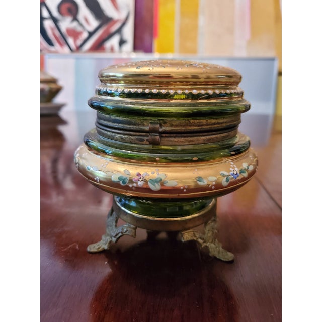 A circa 1900 moser gilt 24k gold decorated and jeweled jewelry box. Having rich raised enamel and gold application on a...