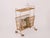 Mid century Italian magazine rack from the 1970s, made from gold colored Iron. Practical as a magazine or blanket holder,...
