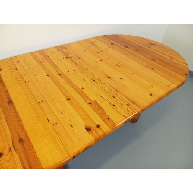 Vintage Scandinavian round table from the 60s and 70s, in pine, Dutch design in the style of Danish designer Rainer...