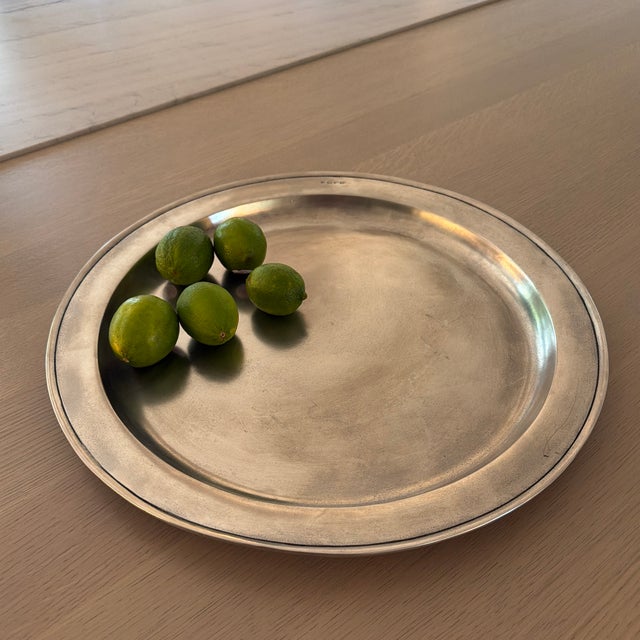 Gorgeous oversized round pewter platter by Match 1995. Would make a wonderful centerpiece platter on a dining table or to...