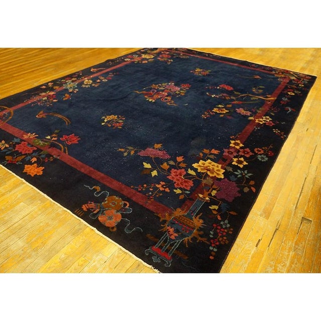 Antique Art Deco Chinese Floral Blue Navy 1920s Rug, Circa Date: 1920s. This exceptional Chinese Art Deco piece captures...
