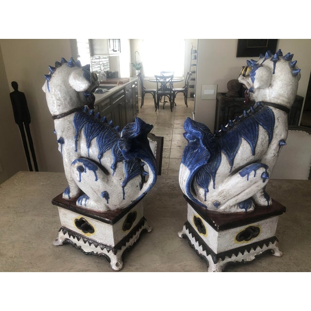 Exceptional pair of large Italian glazed terracotta temple dogs. A beautiful addition to any decor.