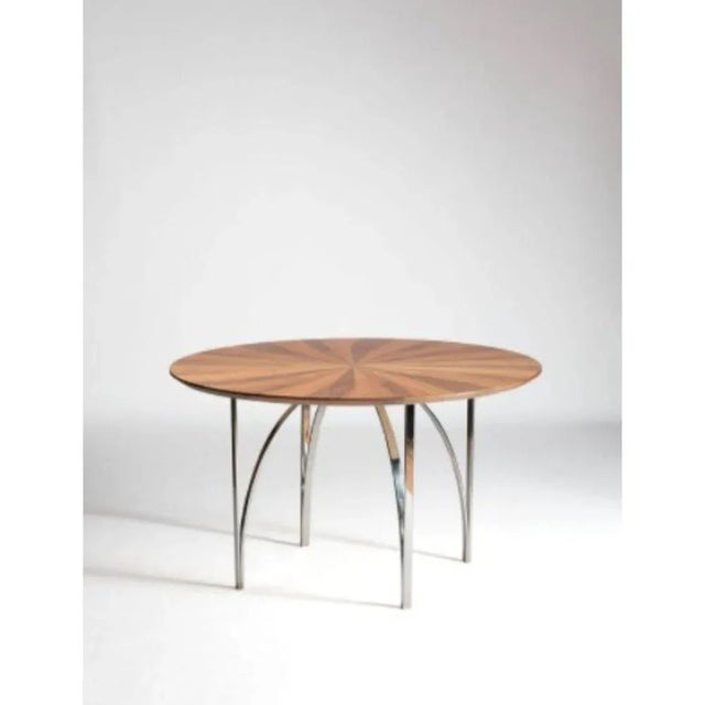 Archie european walnut table by serena confalonieri dimensions: d 130 cm x h 75 cm materials: canaletto walnut , steel or...