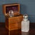 A fine pair of Victorian hobnail cut crystal decanters, complete with their original fitted wooden presentation box and...