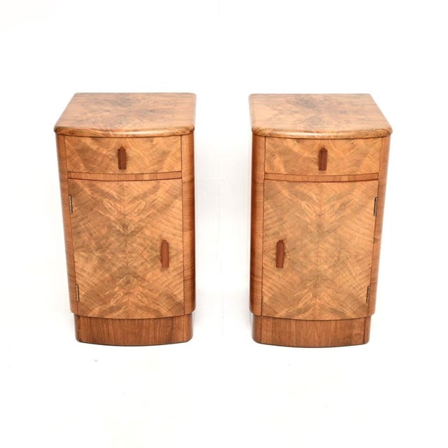A beautifully made pair of Art Deco walnut bedside cabinets. They were made in England, they date from the 1930’s. Made...