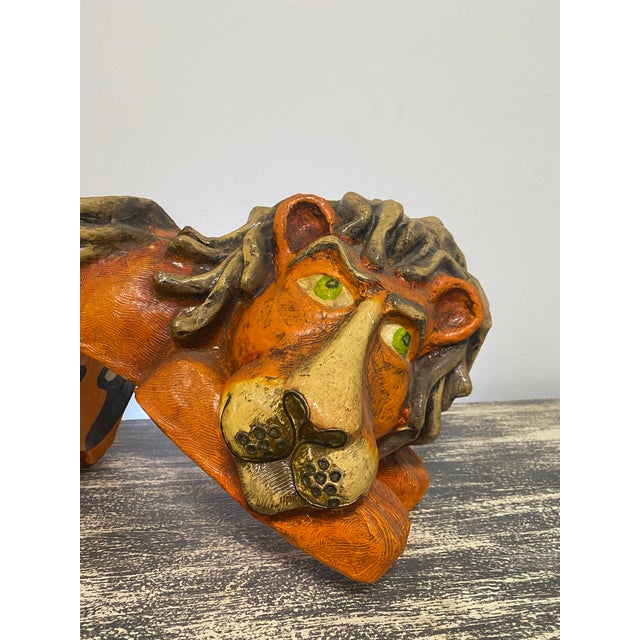 Whimsical vintage reclining lion sculpture by Jeanne Valentine, handcrafted in Mexico from papier-mâché. The piece...