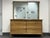 Design Plus Gallery presents a Cadence Dresser + Mirror from Heywood Wakefield. This mid-century inspired set pairs a...