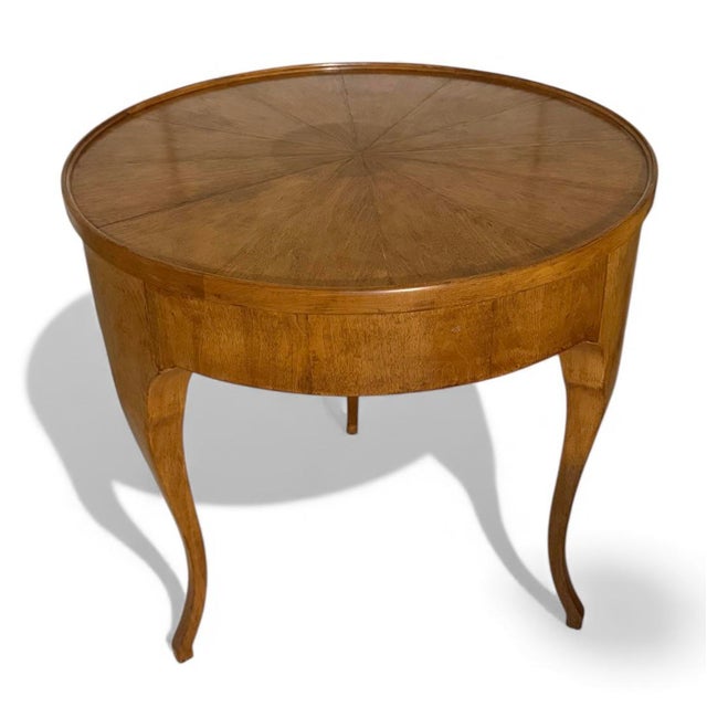 An elegant side table from furniture legend Rose Tarlow. The Tristan table is handmade of walnut and features a starburst...