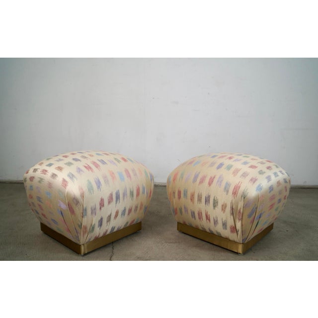 Pair of vintage poufs for sale. They are in the manner of Marge Carson, and are solidly built with a solid wood frame and...