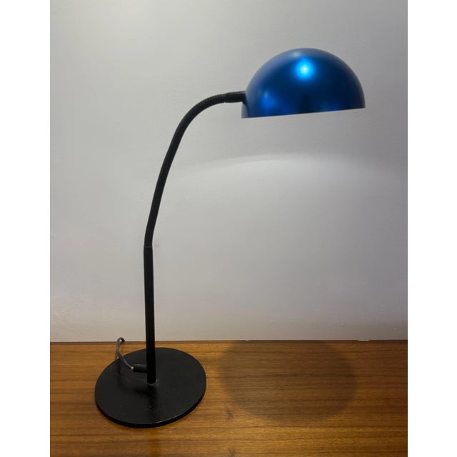 A bold expression of 1980s design, this blue adjustable desk lamp designed by terence conran for habitat in 1983 channels...
