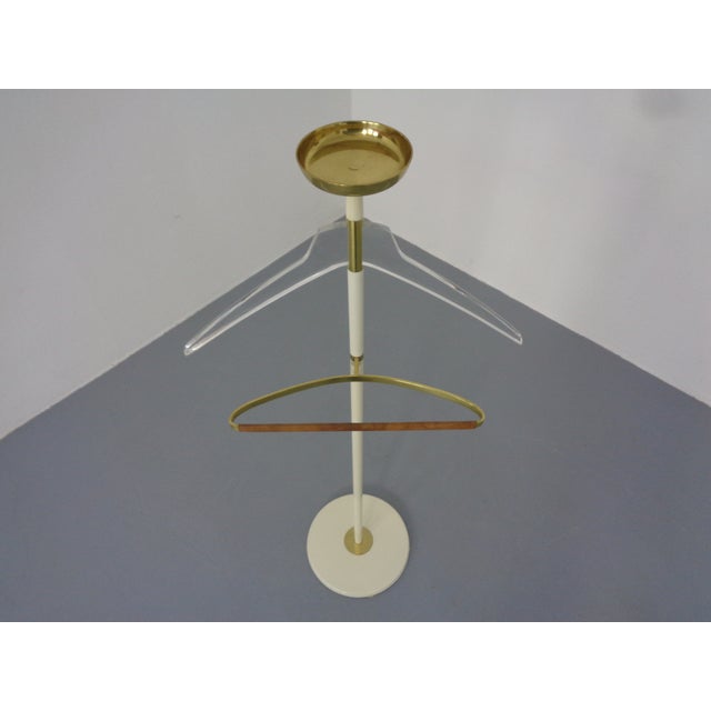 Valet stand made of brass and acrylic glass from United Workshops Munich from the 1960s. I have official proof of...