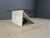 Postmodern angular white marble coffee table with black metal supporst and a clear bevelde glass top. Timeless design,...