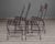French Set of Four French Iron Curule Side Chairs With Woven Strap Seats For Sale - Image 3 of 12