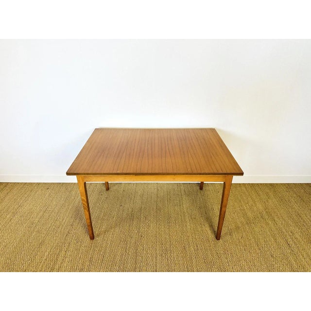Scandinavian vintage teak dining table from the sixties made up of two extensions. dimensions: h73.5 l124.5 lr221 d84.5