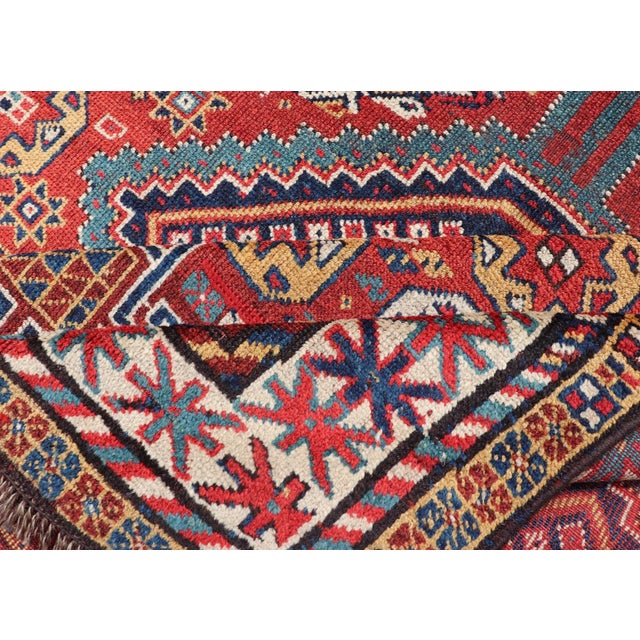 Antique Qashqai Rug With Geometric Motifs in Red, Blue, and Golden Yellow For Sale - Image 11 of 13