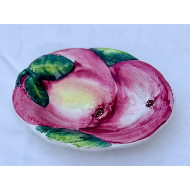 This lovely majolica catchall is designed in the shape of two peaches and green leaves. It's the perfect size to hold...