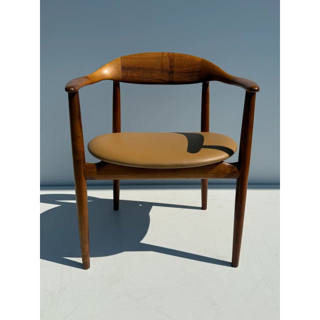 Mid Century Danish Modern teak chair designed by Kurt Ostervig and newly reupholstered in beautiful cream / camel color...