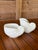 A charming vintage Hutschenreuther porcelain sugar bowl and creamer set, beautifully modeled in the form of nautilus...