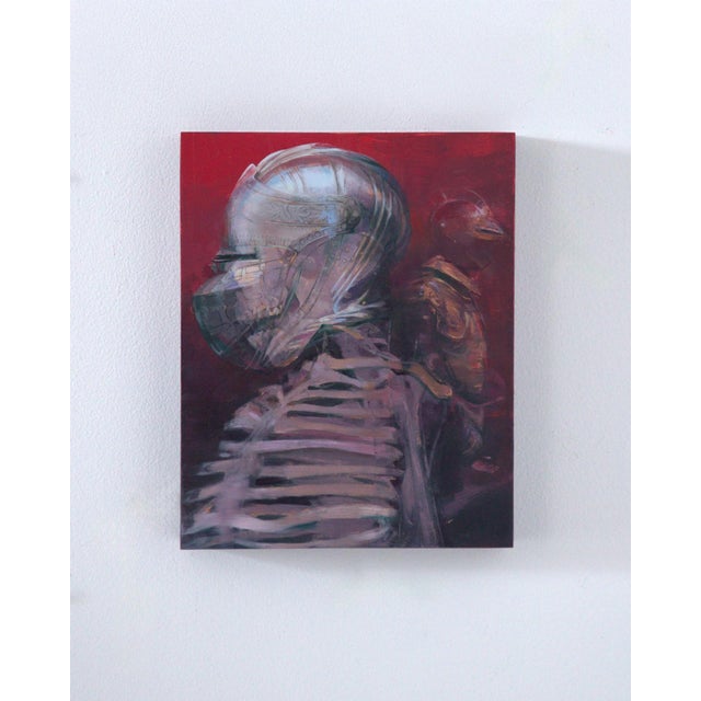 The artwork depicts a striking juxtaposition of skeletal and armored forms, capturing a moment of introspection and...