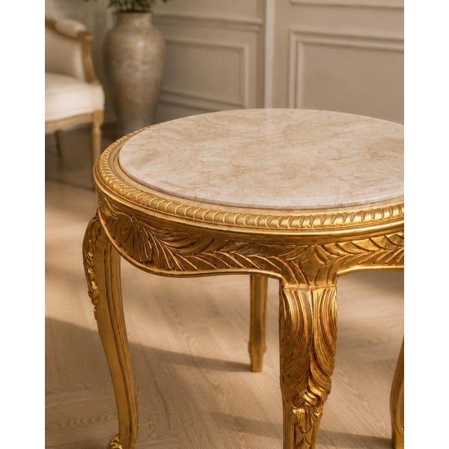 This elegant circa 1970 Louis XVI–style side table combines classical French-inspired design with fine artisan...