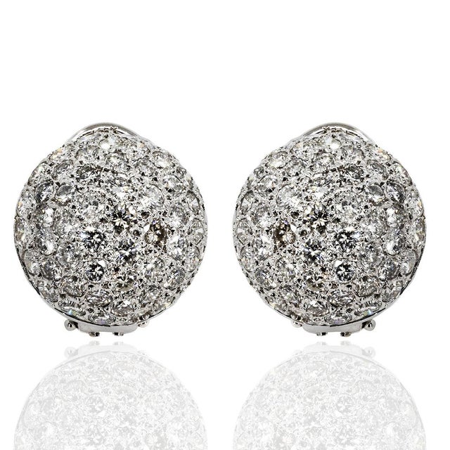 14k White gold dome earrings with approximately 5.00 carats of round brillinat diamonds. 7.85 grams