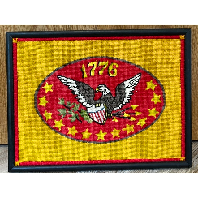 Finished vintage 1976 Bicentennial needlepoint featuring a central American bald eagle holding an American flag shield,...