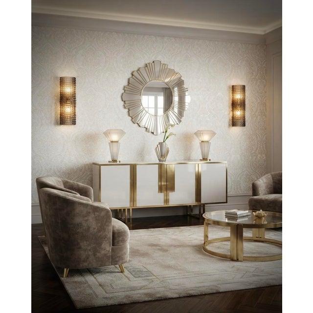 This Murano glass wall sconce features a stunning frame. A truly unique and rare glass with a smoky gold effect; classic...