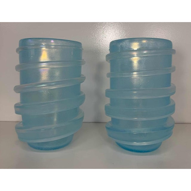 An exceptional pair of sculptural Murano glass vases produced by Cenedese in Murano, Italy. Each vase is masterfully hand-...