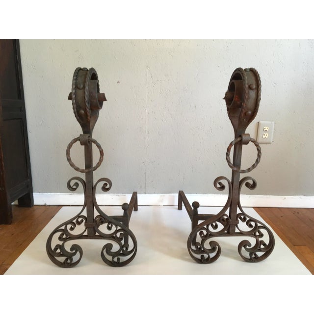 These large 19th-C. French andirons are hand forged out of iron. Age wear.