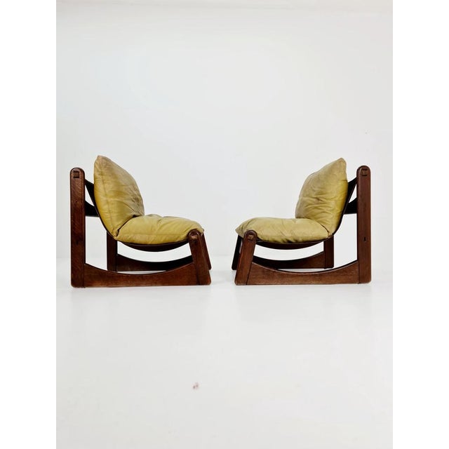 1 of 2 mid century armchairs in leather and wood By Straub Germany , 1960s The beautiful armchair is comfortable and...