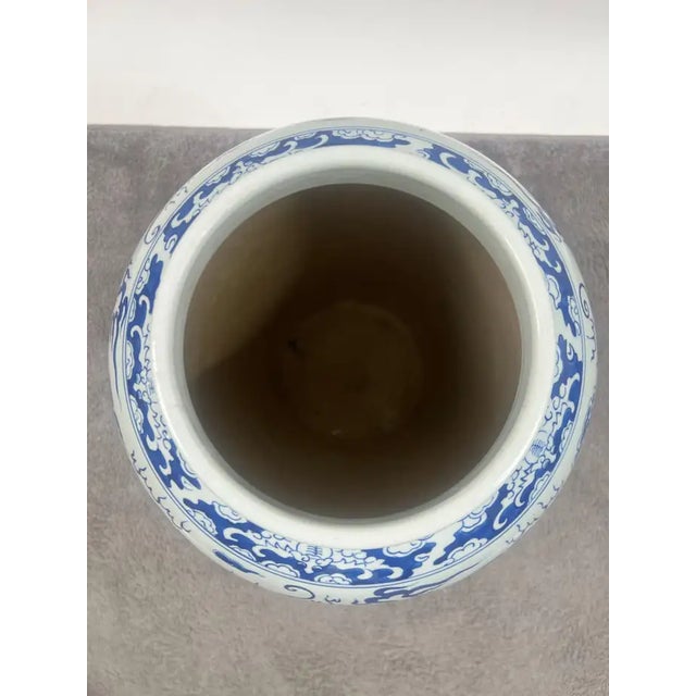 Imperial Chinese Qing Dynasty Style Blue & White Dragon Porcelain Vase This stunning blue and white Chinese porcelain vase...