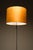 A floor lamp with steel 3-star foot with a newly restored lampshade in yellow silk. Holds 3 bulbs, a group of 2 and 1...