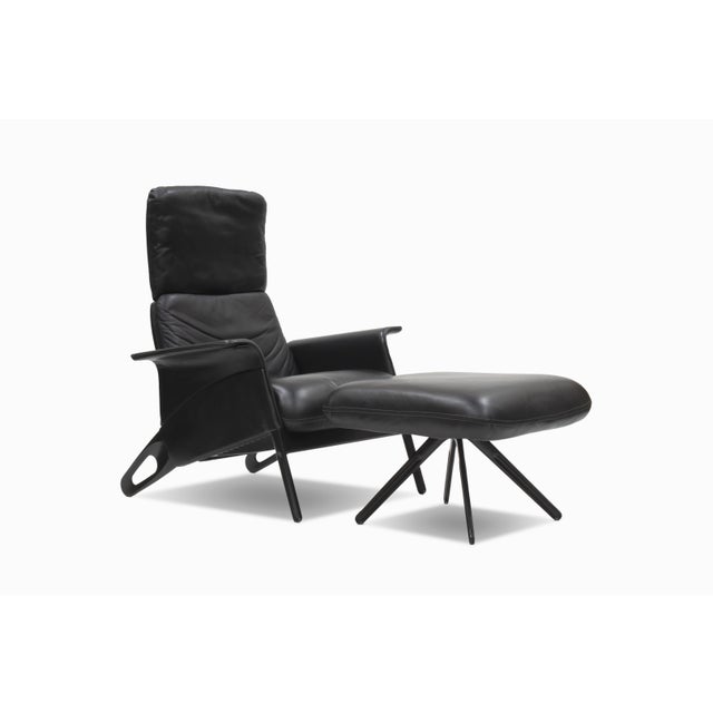 Here is a rare lounge chair and ottoman by Geoff Hollington for Herman Miller, 1989. The heavy duty construction is clad...