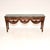 A spectacular antique carved solid walnut marble top console table. It is in the Victorian style, this was made in England...