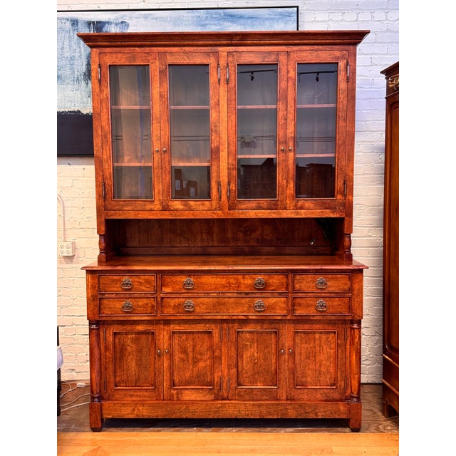 Design Plus Gallery presents the Model 9240 + 9251 Display Cabinet from Bausman & Company. The upper section has four...