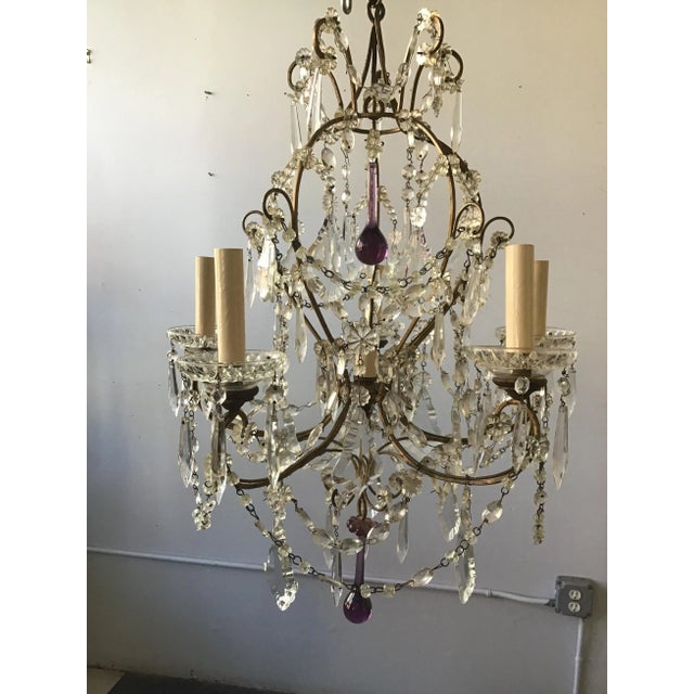 1960s Italian crystal chandelier. Iron frame. A few crystals missing.