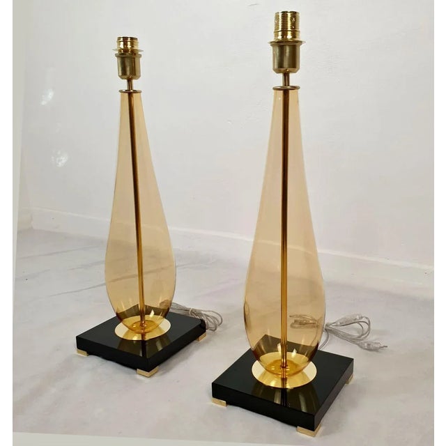 Pair of amber Murano glass table lamps Mazzega style, Italy 1990s. Set of four lamps, two pairs of lamps available. Sold...