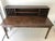 Tuscan Chestnut finished pieces are built from solid pine and pine veneer; hardware has an antique brass finish. The use...