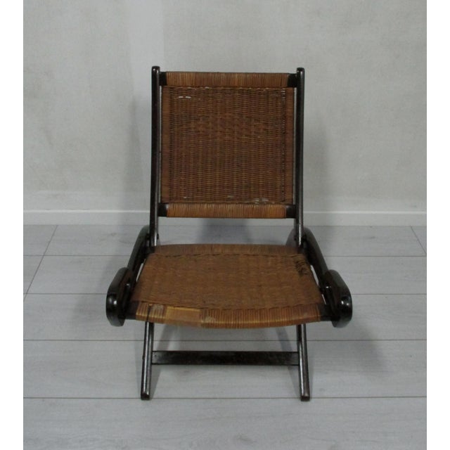 Splendid folding armchair designed by Gio Ponti, Ninfea model, produced by Fratelli Reguitti from the 1958 period, made of...
