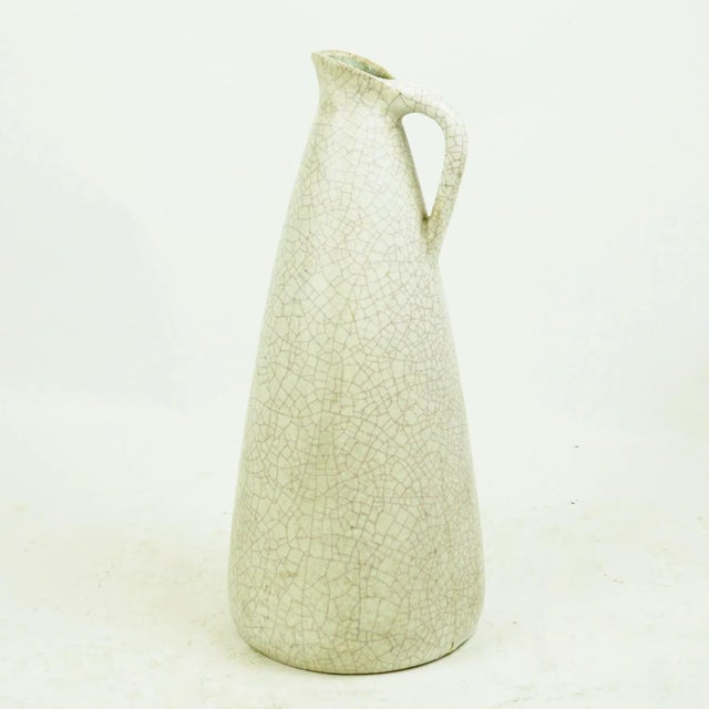 Large German Midcentury handled ceramic vase or jar with off white craquelling glaze. Marked on bottom : Handmade Germany, L.