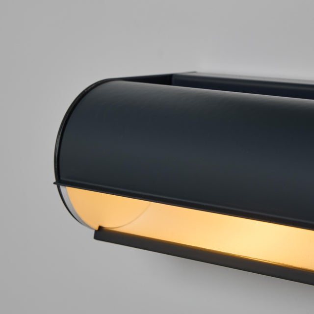 Charlotte Perriand 'Applique Cylindrique Petite' wall lamp in anthracite. Perriand's iconic 'Applique Cylindrique'...