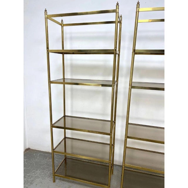 Hollywood Regency Pair of Billy Baldwin Style Brass Etageres With Smoked Glass Shelves For Sale - Image 3 of 6