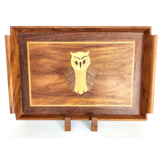 Offered is a vintage mid 20th Century inlaid wood tray with intricate marquetry depicting an owl in a mix of tropical...