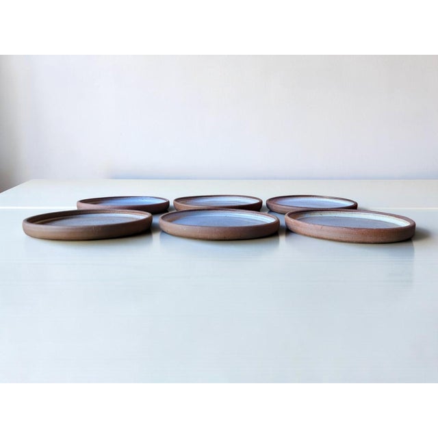 Six stoneware plates from Ratilly / J&N Pierlot / Puisaye Norbert Pierlot (1919–1979): French actor and ceramicist, born...