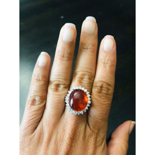 16.69 Carat Cabochon Spessartine Diamond White Gold Cocktail Ring! This beautiful ring has a huge 15.51 Carat Cabochon...