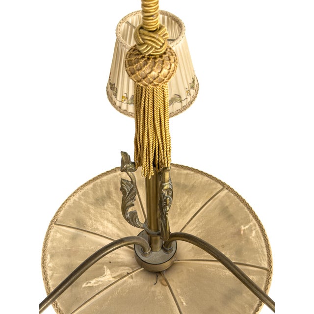 Elegant Swedish pendant chandelier from the early post-war period. The fixture features three curved brass arms fitted...