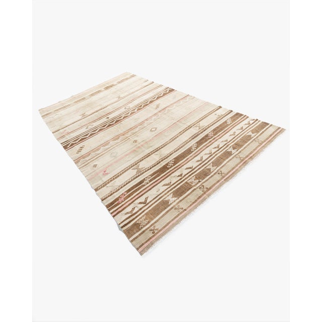 A vintage circa 1940s Turkish hand-woven hemp Kilim. The simplicity and boldness of this piece gives a contemporary feel...