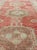 Measures: 4'5 x 7'7. Vintage Turkish Oushak Rug with Soft Coral, Pale Mint, and Warm Beige Tones. Keivan Woven Arts / rug...