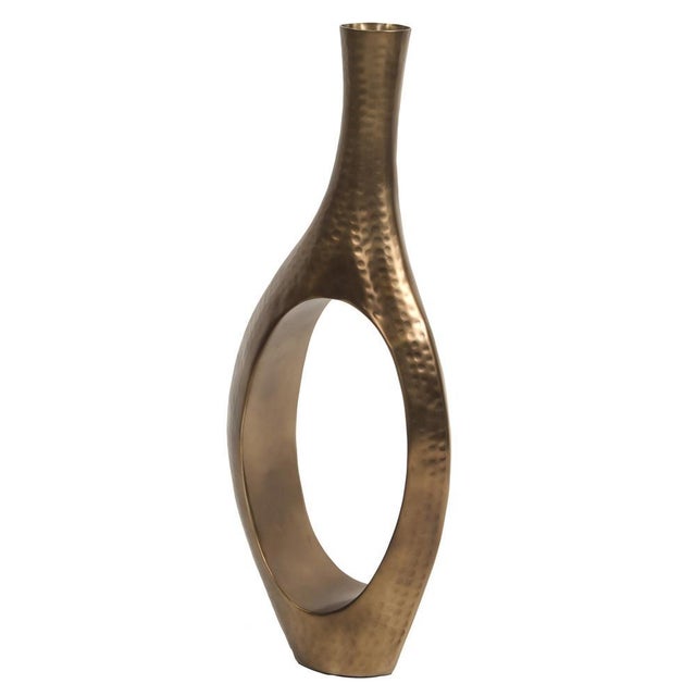 This piece is more sculpture than functional vase. It features a dramatic elongated body with a circular opening set in...